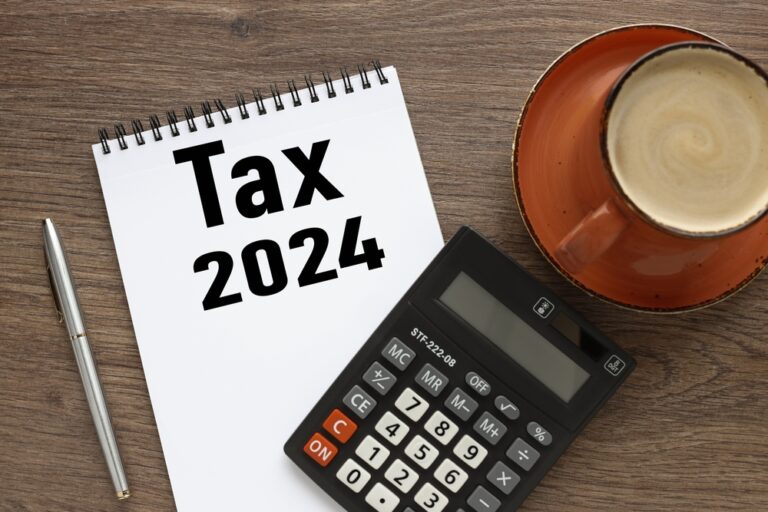 Tax-,2024.,Notepad,With,Text,Near,Calculator