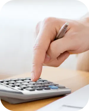 A person using a calculator